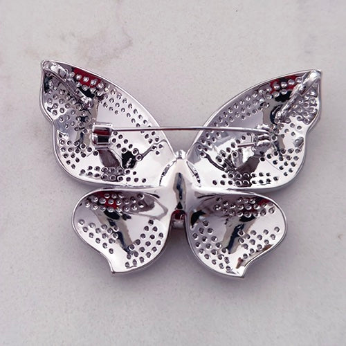 Purple stone butterfly brooch