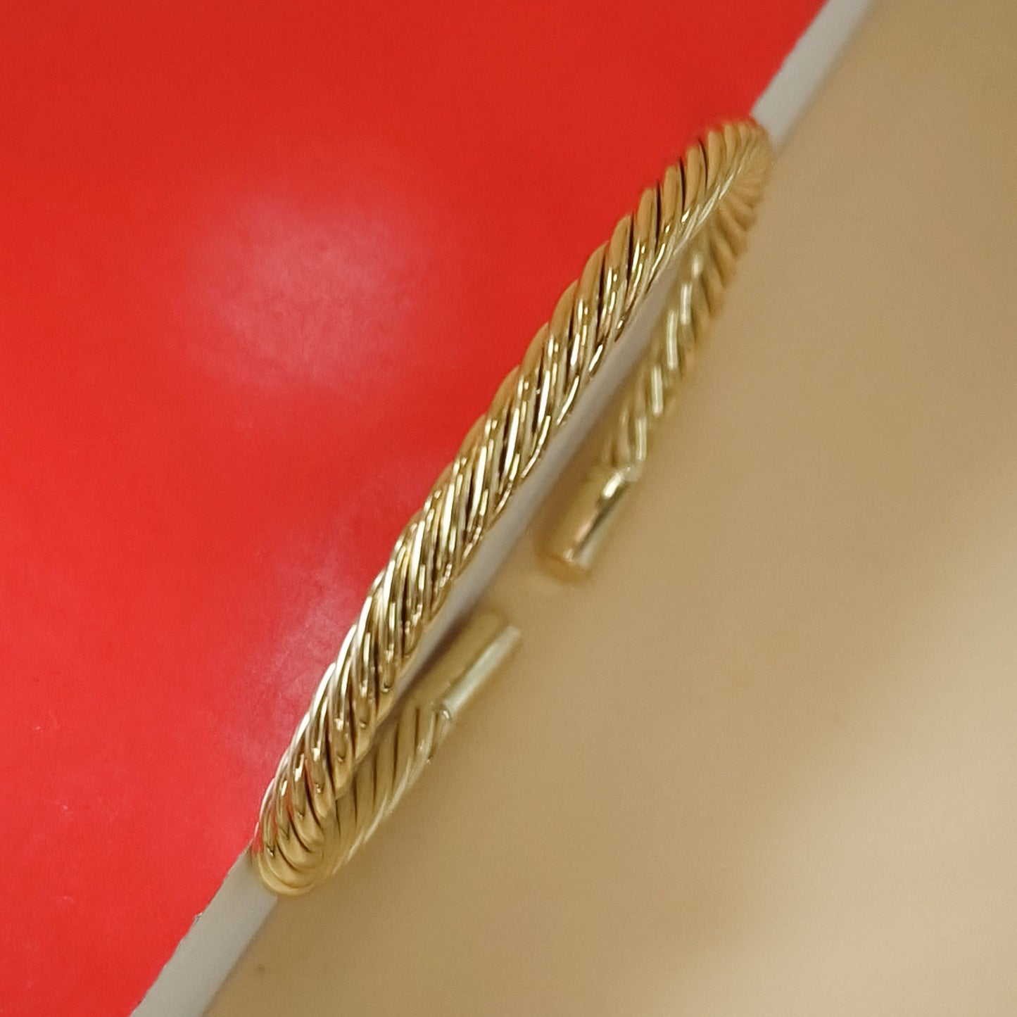 Gold plated twisted thin bangle cuff