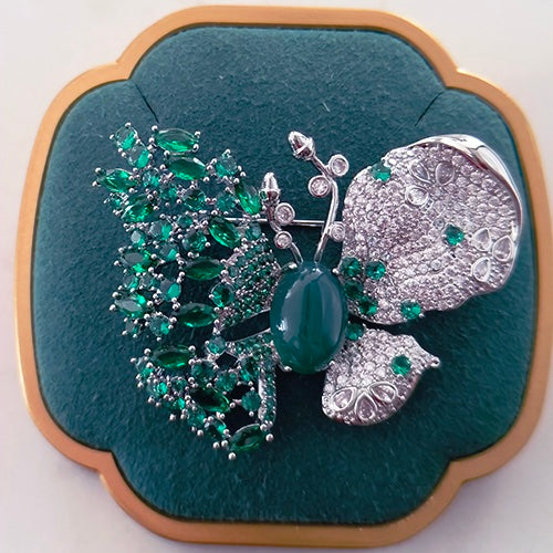 Green butterfly brooch