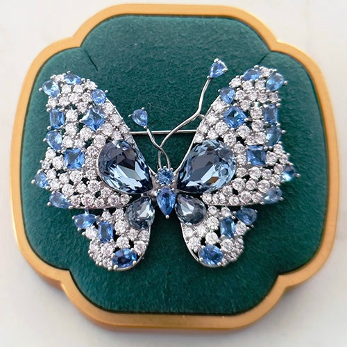 Blue butterfly brooch