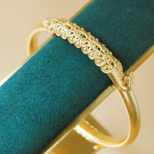 Elegant Floral Lace Gold Plated Bangle With Petal Design