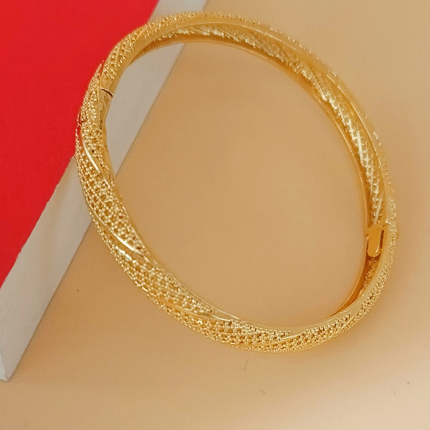 Twist Textured Gold Plated Bangle