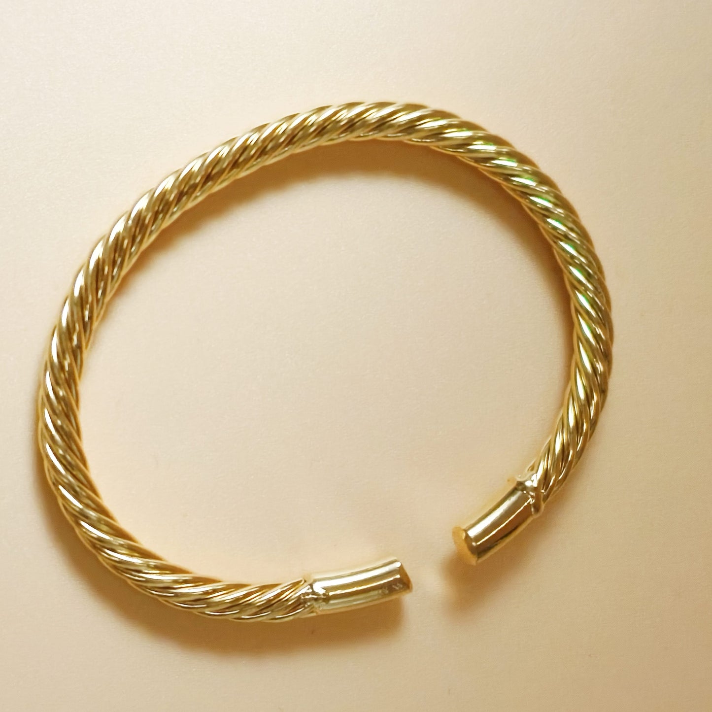Gold plated twisted thin bangle cuff