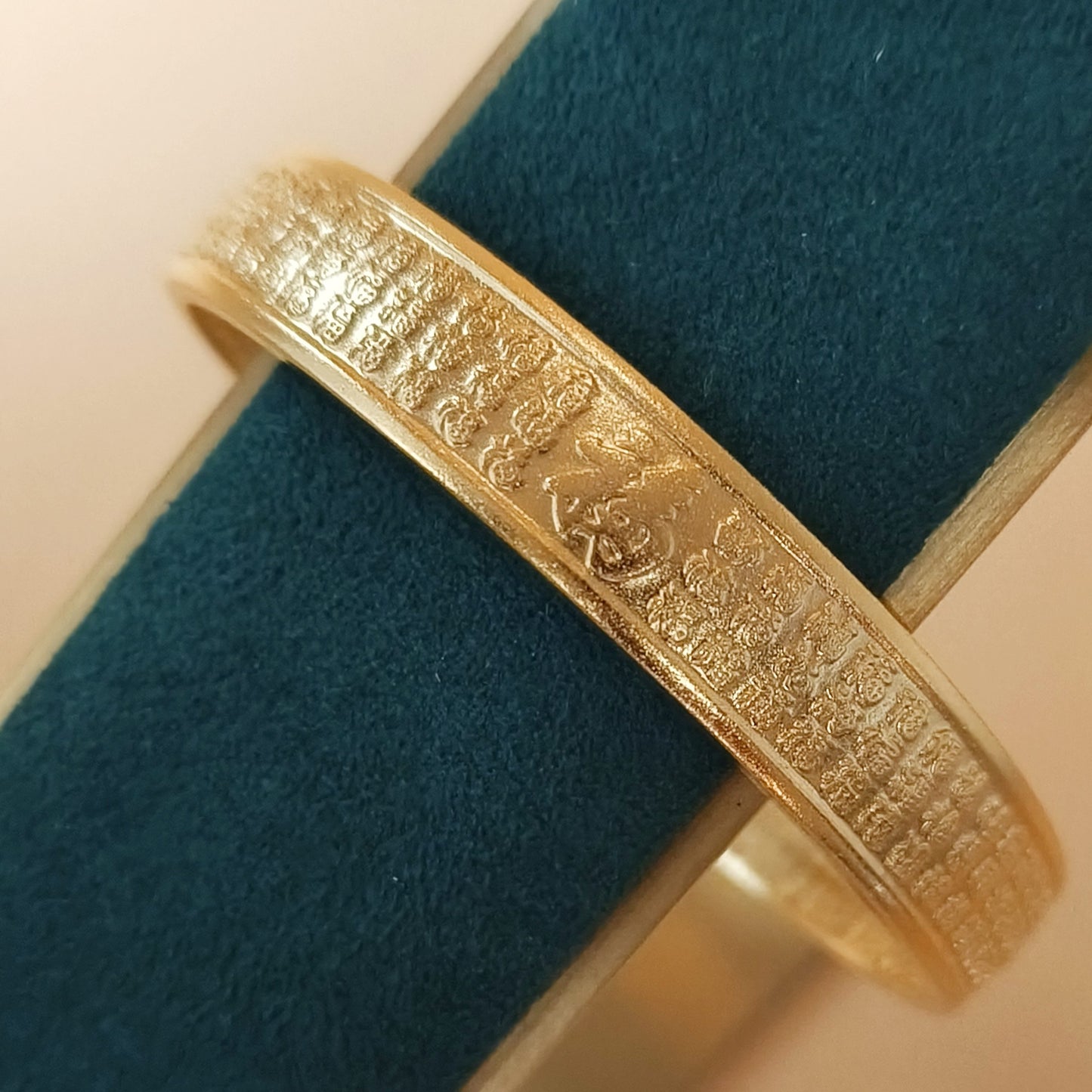 Gold plated calligraphy pattern detail cuff bangle