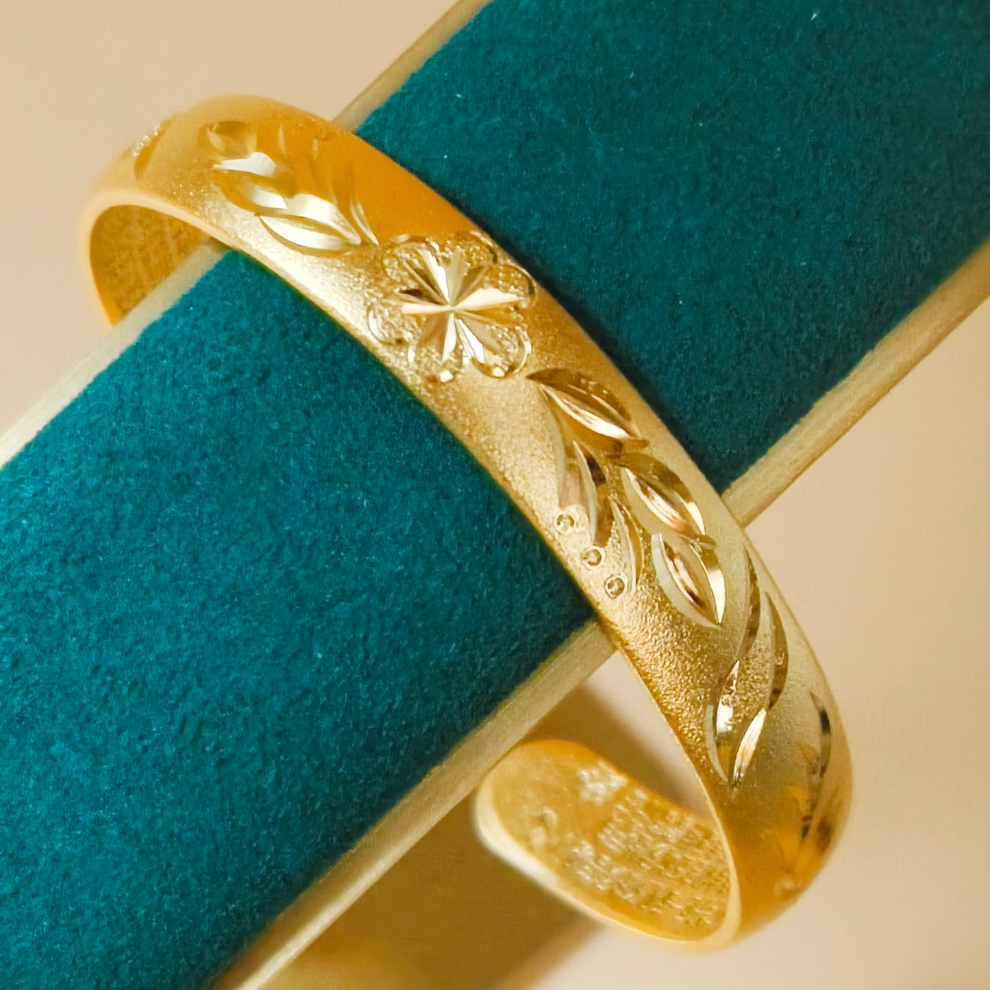 Gold plated floral detail cuff bangle