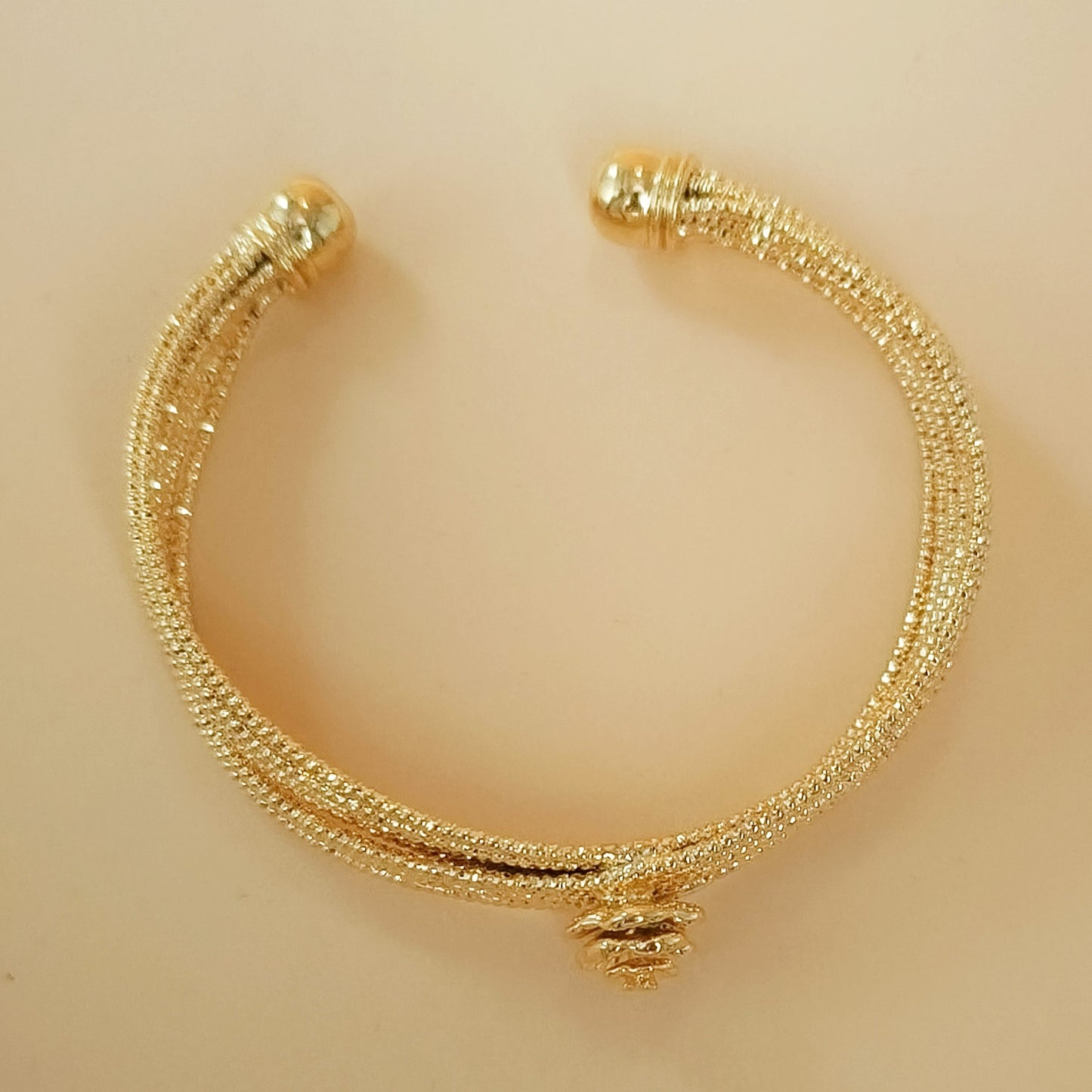 Gold plated flower knot cuff bangle
