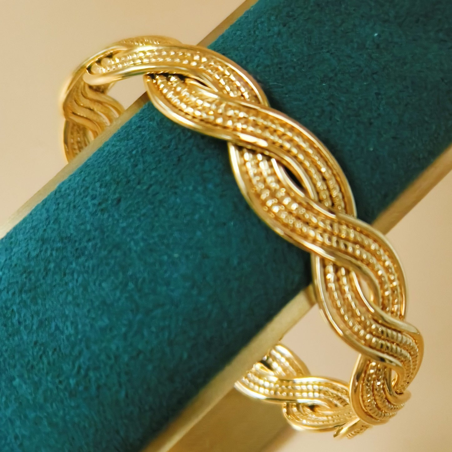 Gold plated braided twist cuff bangle