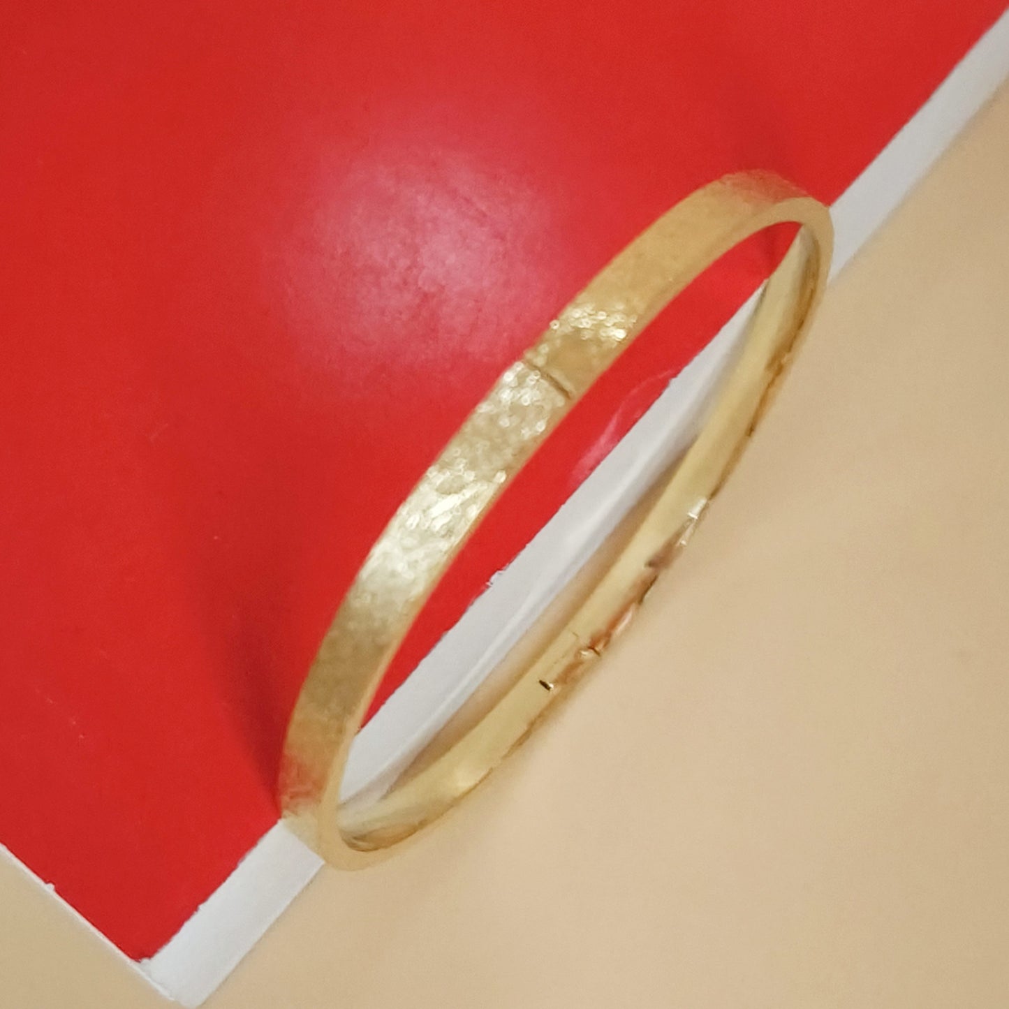Textured gold plated bangle