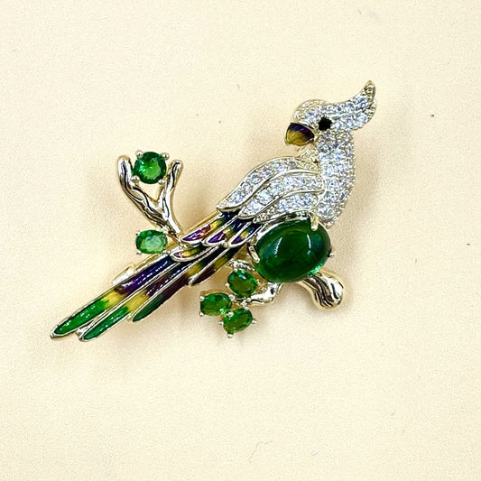Gold Parrot Brooch with green stone