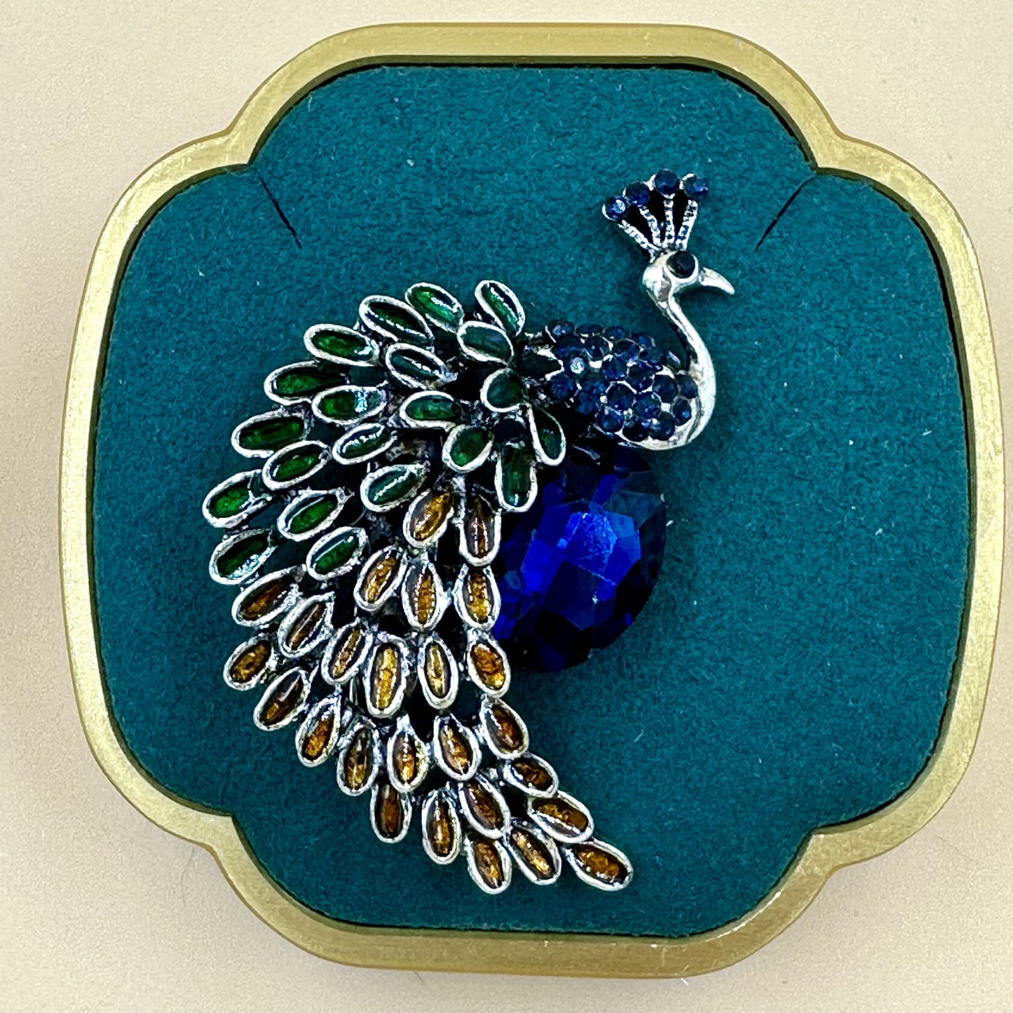 Peacock brooch