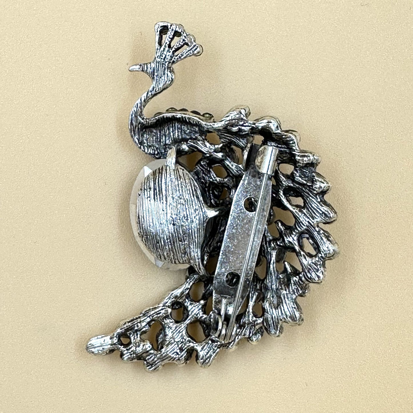 Peacock brooch