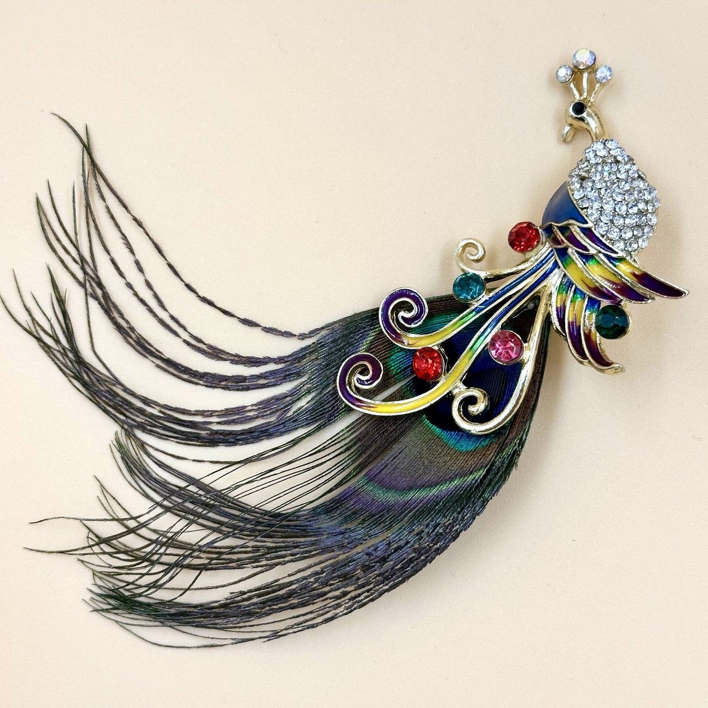 Peacock feather brooch