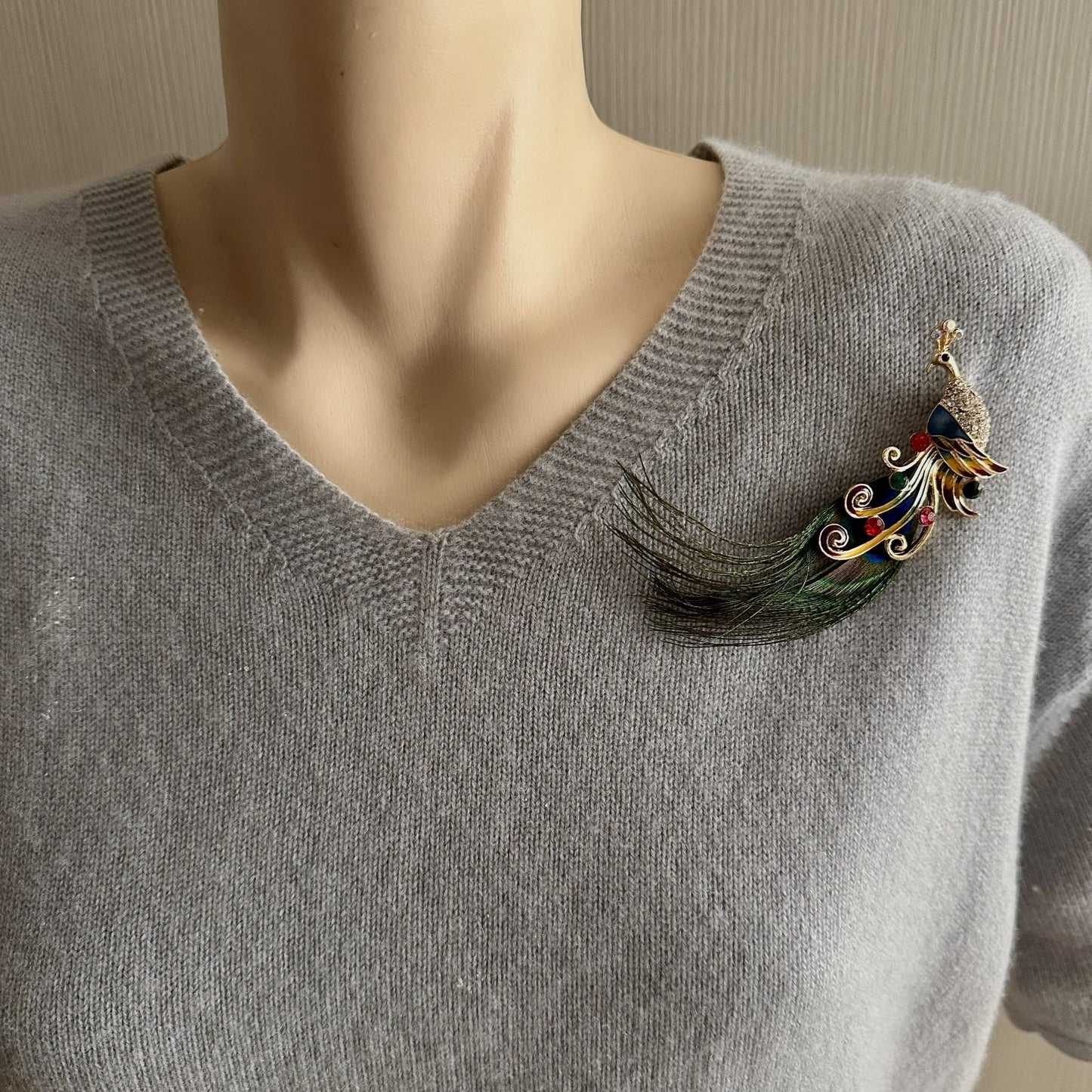 Peacock feather brooch